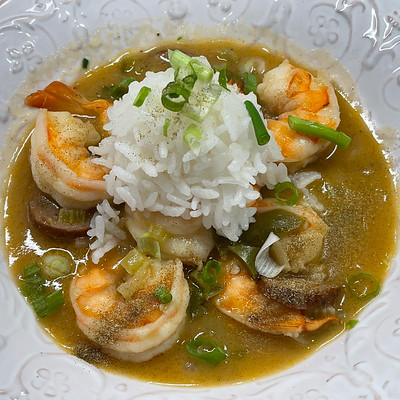 A Small Bowl of Greenish Gumbo with Shrimp